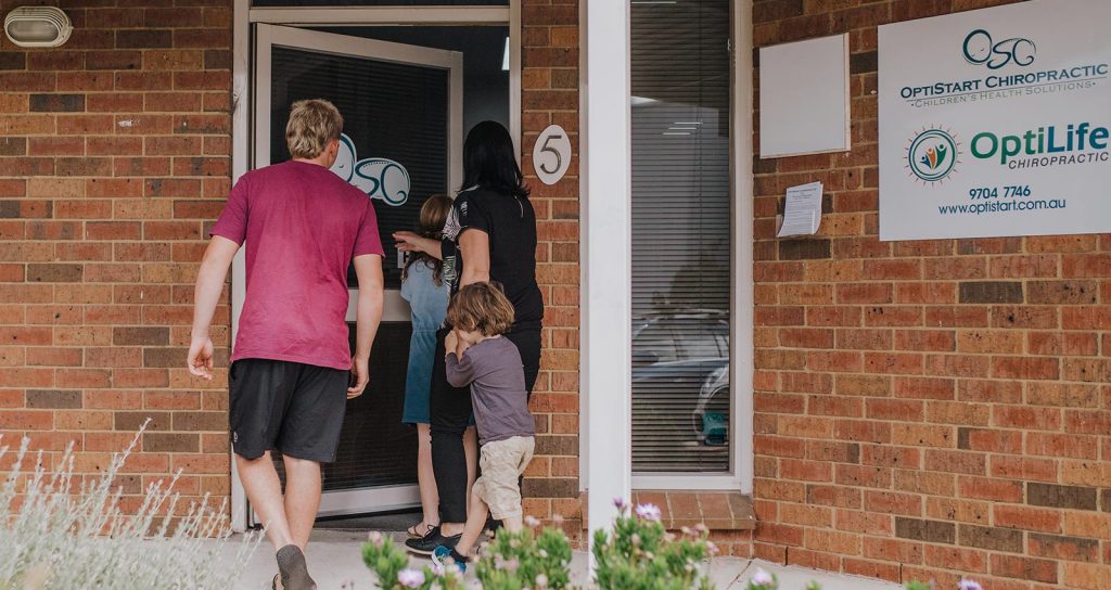 Family walking into the practice